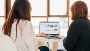 Homebuyers comparing Dubai off-plan and ready properties online to determine the best real estate investment option in 2026